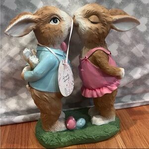 Easter bunnies kissing